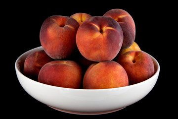 Bowl of Peaches on a Black Background