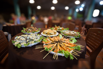 meat and sea dishes in the depth of field