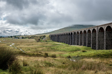 Famous Ribblehead Viaduct in Yorkshire Dales National Park in England.