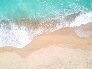 Aerial view of sandy beach and ocean with waves - 167968654