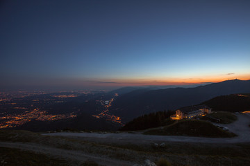 Blue hour on venetian prealps and Vittorio Veneto mountain hut, Veneto, Italy