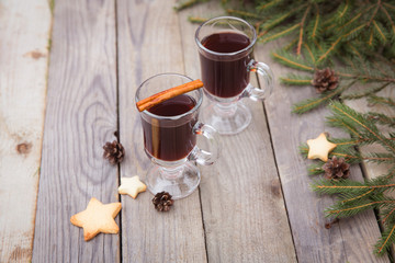 christmas concept mulled wine hot alcoholic drink with spices garnished autumn leaves space for text
