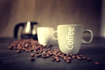 Wandaufkleber Kaffeemaschine mit Tasse und Kaffeebohnen © guy
