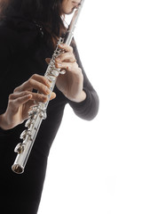 Flute player. Flutist playing flute instrument hands