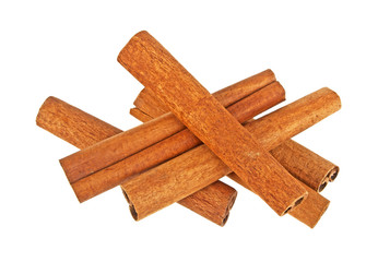Pile of cinnamon sticks on a white background, Spices