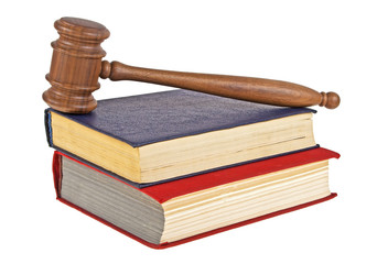 Judge gavel and two books isolated on a white background