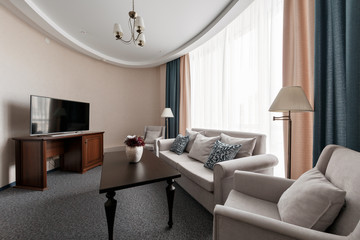 Hotel apartment, living room interior in the morning