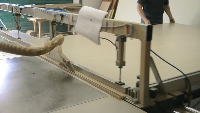 Production of cabinet furniture, sawing, materials on a format-cutting machine
