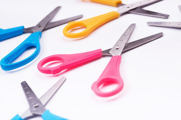 Scissors on white background