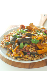 Salad with pumpkin, chickpeas and sauce - 167977633