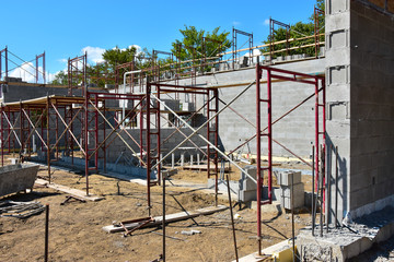 Concrete block commercial building under construction.