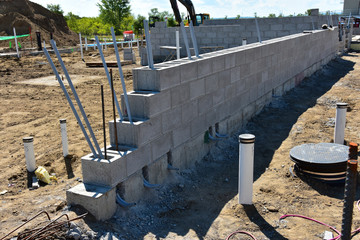 Concrete block commercial building under construction.