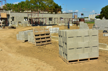Concrete block commercial building under construction.
