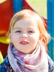 Cute smiling baby girl outdoors