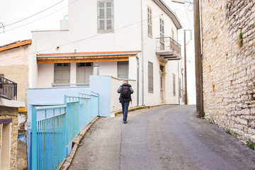 happy young man traveling with backpack