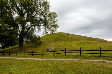 Fototapeta premium Royal Mounds - large barrows located in Gamla Uppsala village, Uppland, Sweden