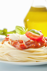 Spaghetti with tomato sauce and parmesan