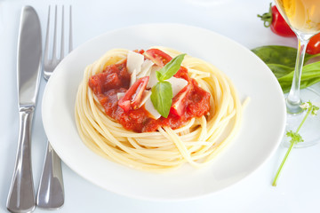 Spaghetti with tomato sauce and parmesan