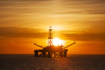 Offshore installation in The Middle of The Sea at Sunset Time 
