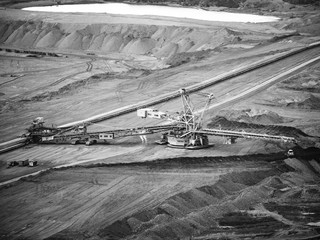 Fototapeta premium Giant conveyor in surface coal mine, Northern Bohemia, Czech Republic. . Black and white image.