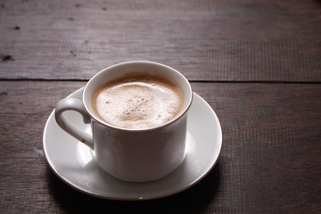 Cup of coffee made from fresh roasted coffee beans