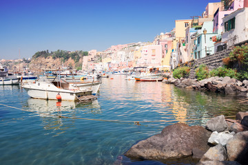 Fototapeta na wymiar Procida island colorful town with harbor at summer, Italy