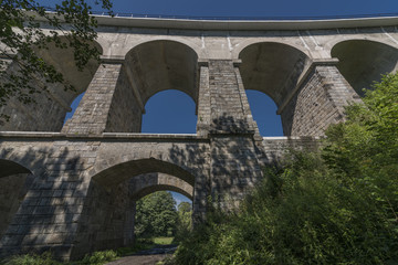 Fototapeta premium Stone rail viaduct near Sychrov village