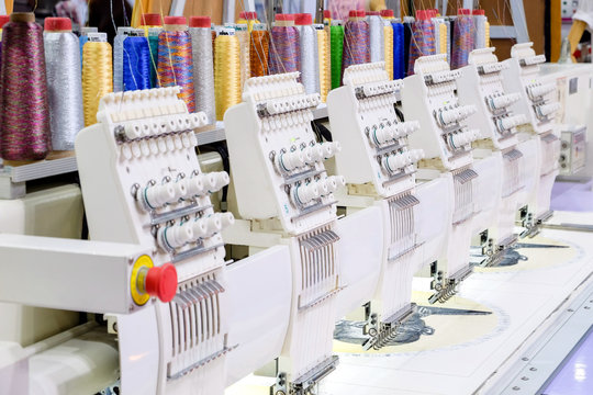 Embroidery machine on factory industry manufacture, industry 4.0