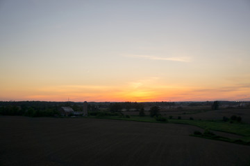 Fototapeta premium Sunset on farmer field 
