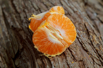 Still life with orange on wood background