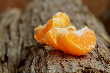 Still life with orange on wood background