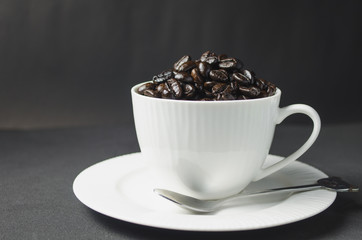 Big coffee cup and coffee bean