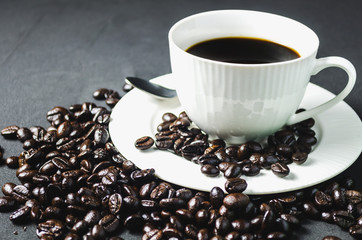 background white cup and coffee bean