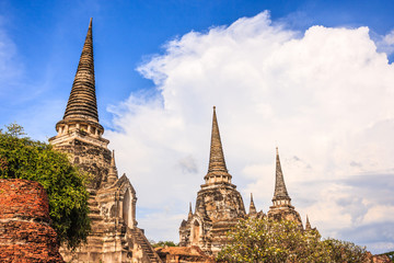 Fototapeta premium View of asian religious architecture ancient Pagodas in Wat Phra Sri Sanphet Historical Park, Ayuthaya province, Thailand, Southeast Asia. Thailand's top historic landmark, attraction and destination
