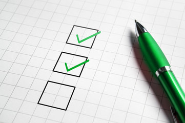 Checklist and to do list with v sign check marks in square box. Pen and paper. Project management,...