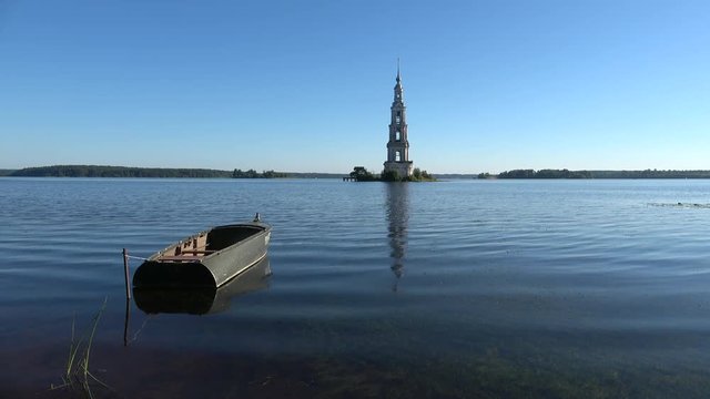 View of the flooded belfry of St. Nicholas Cathedral on a summer morning. Kalyazin, Russia