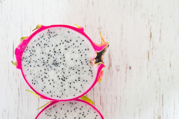 Healthy dragon fruits on wooden background,Dragon fruit on wooden background close up with copy space