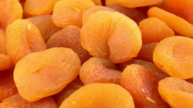 Rotating Dried Apricots (seamless loopable 4K UHD footage)