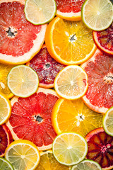 Fototapeta na wymiar Slices of citrus fruits.