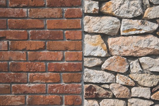 Red brick wall and stone wall background of colorful stones with matt film effect