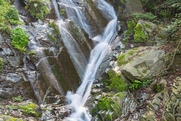 Stream Flowing Through Rocks.