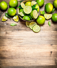 Ripe limes in a bowl.