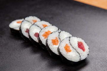 Sushi maki with tuna and salmon as a sign of yin and yang