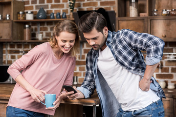 couple using smartphone