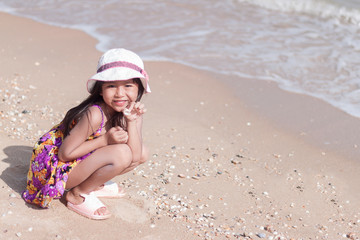 portrait of asian lovely girl on the beach