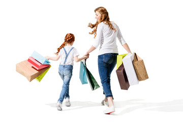 mother and daughter with shopping bags