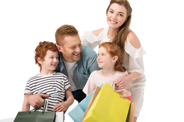 happy family with shopping bags