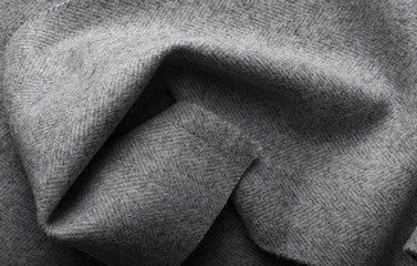  tweed fabric, wool gray herringbone textile background.
