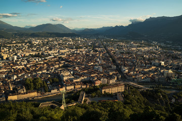 Panoramic view of Grenoble in the sunset with the Vercors massif in the background