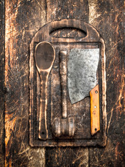 Serving background. Old kitchen tools cutting Board.